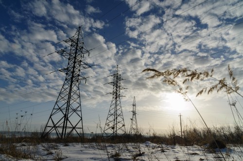 Power lines in a field near Ivano-Frankivsk region, western Ukraine during the sun set. Electricity rose by 21% in February due to energy problems. (Photo by Mykola Tys / SOPA Images/Sipa USA)No Use Germany.