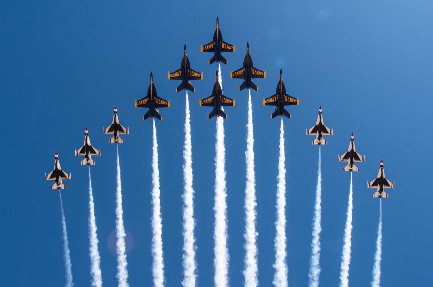 The United States Air Force Air Demonstration Squadron "Thunderbirds" and the United States Navy Flight Demonstration Squadron, the Blue Angels, debut the Super Delta formation consisting of six F-16 Fighting Falcons and six F/A-18 Super Hornets over a C-130J Super Hercules at Naval Air Facility El Centro, March 2, 2021. This is the first time the demo teams performed the formation which grew out of joint training opportunities held in 2020 and 2021.Where: NAF El Centro, California, United StatesWhen: 02 Mar 2021Credit: AF Thunderbirds/Cover-Images.com**Editorial Use Only**