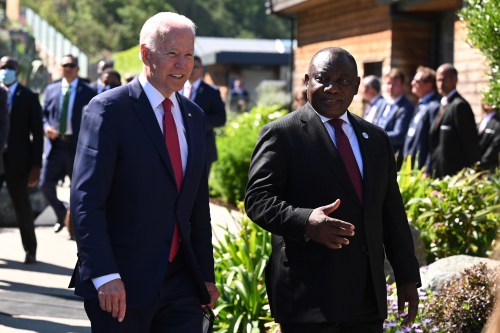 U.S. President Joe Biden talks with South Africa's President Cyril Ramaphosa as they arrive for a working session during G7 summit in Carbis Bay, Cornwall, Britain, June 12, 2021. Leon Neal/Pool via REUTERS