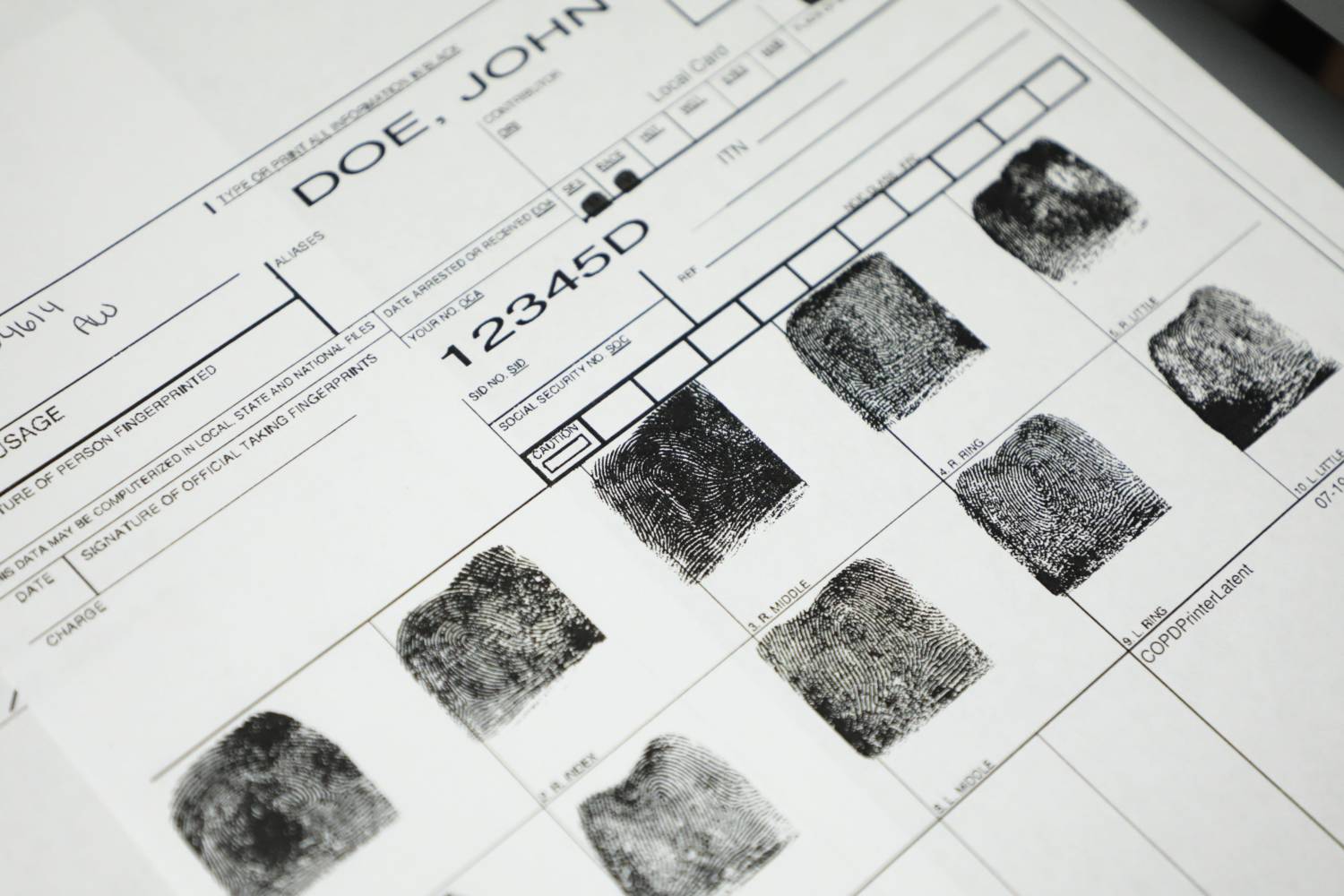 Fingerprints for a John Doe on Tuesday, September 17, 2019 at the Columbus Division of Police Forensic Services Center in Columbus, Ohio. In a Nov. 18, 2020, letter to law enforcement and courts, Attorney General Dave Yost's office reinforced their legal obligation to provide fingerprints and arrest records to keep updated state records used to run background checks for those purchasing guns or obtaining a concealed carry permit. [Joshua A. Bickel/Dispatch]Mt Crime Lab Jb 16