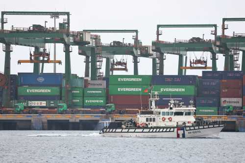 FILE PHOTO: A coast guard ship sails at the Port of Taipei in Taipei, Taiwan February 9, 2021. REUTERS/Ann Wang/File Photo