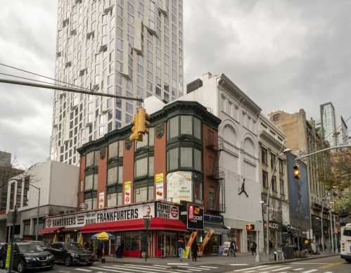 Development in Downtown Brooklyn in New York contrasts with older low rise buildings, on Sunday, April 18, 2021. Because of increased development in the area, notably hi-rise luxury apartment buildings, chain stores and high-end retailers are moving in. (Photo by Richard B. Levine)No Use Germany.