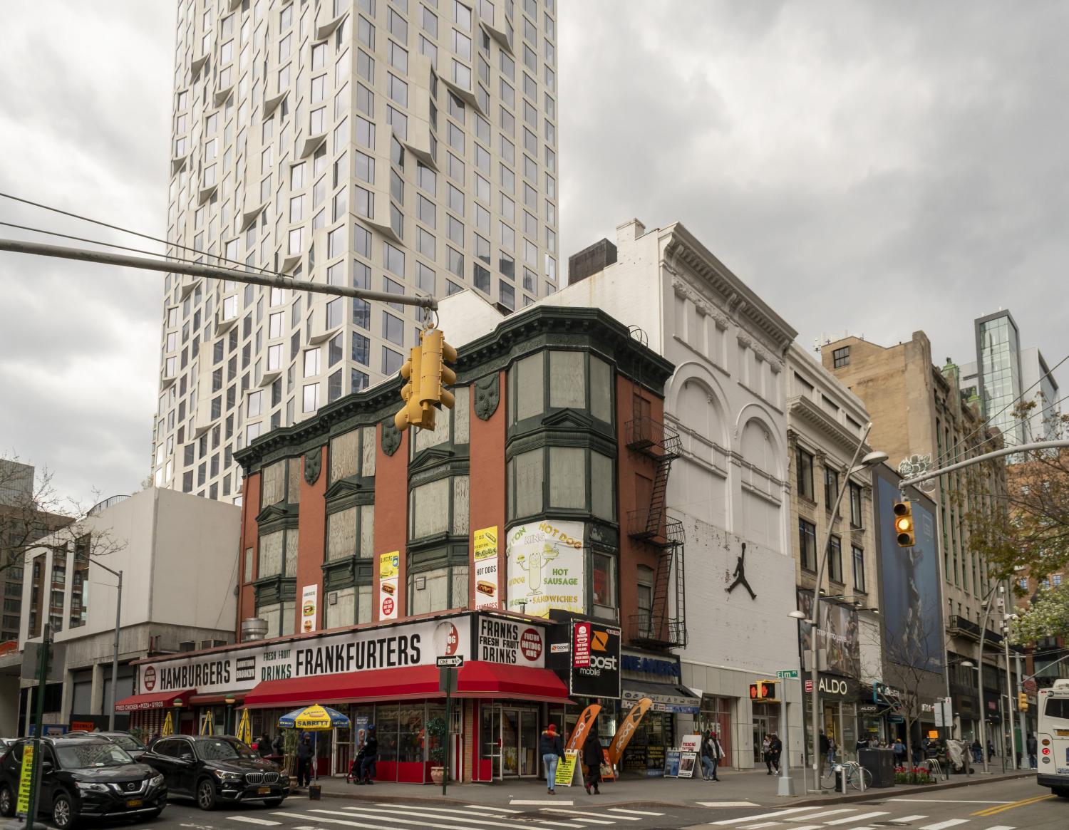 Development in Downtown Brooklyn in New York contrasts with older low rise buildings, on Sunday, April 18, 2021. Because of increased development in the area, notably hi-rise luxury apartment buildings, chain stores and high-end retailers are moving in. (Photo by Richard B. Levine)No Use Germany.