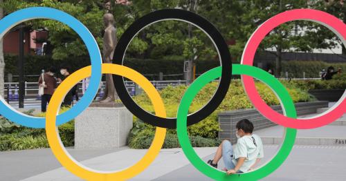 A photo shows a five-ring Olympic emblem in front of National Stadium in Shinjuku Ward, Tokyo on May 30, 2021.    ( The Yomiuri Shimbun )