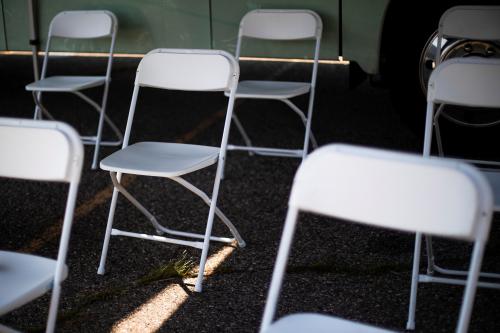Empty chairs fill a waiting area for people after they receive their coronavirus disease (COVID-19) vaccines at a mobile pop-up vaccination clinic hosted by the Detroit Health Department with the Detroit Public Schools Community District at Renaissance High School in Detroit, Michigan, U.S., July 26, 2021. REUTERS/Emily Elconin