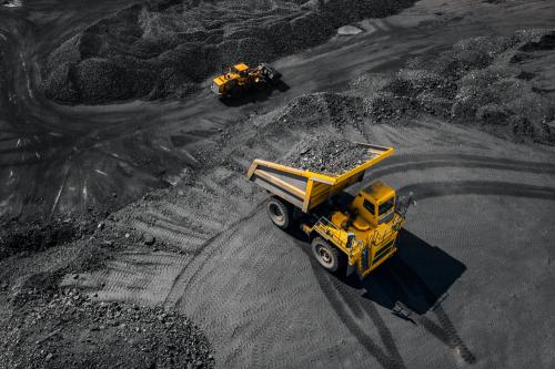 Dump truck full of coal in an open-pit coal mine