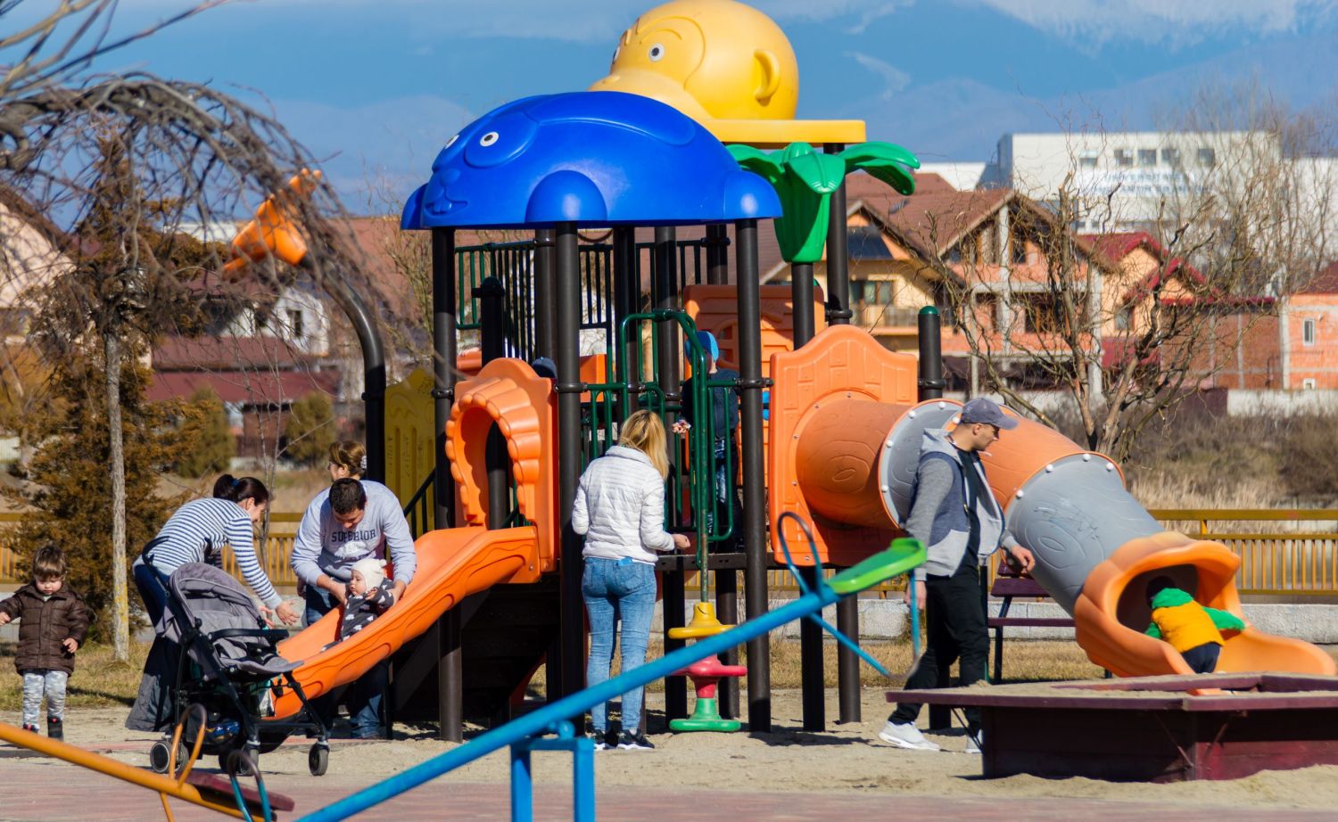 Children play and learn at a city playground.