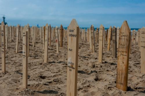On the day of 'World Refugee Day,' people across Europe commemorate the 44,000+ victims who died on European borders in the past years. On the beach of Scheveningen, in The Hague, a pop-up memorial monument was placed close to the sea to pay the last respect to the victims. The memorial monument consisted of 44,000 memorial signs out of wood sticking out of the sand on the beach with the names of the victims written on them. (Photo by /Sipa USA)