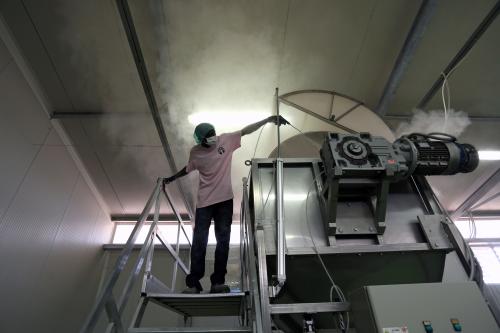 An employee cleans a machine inside the factory of the baobab Fruit Company Senegal in Thies, Senegal June 22, 2018. Picture taken June 22, 2018. REUTERS/Mikal McAllister