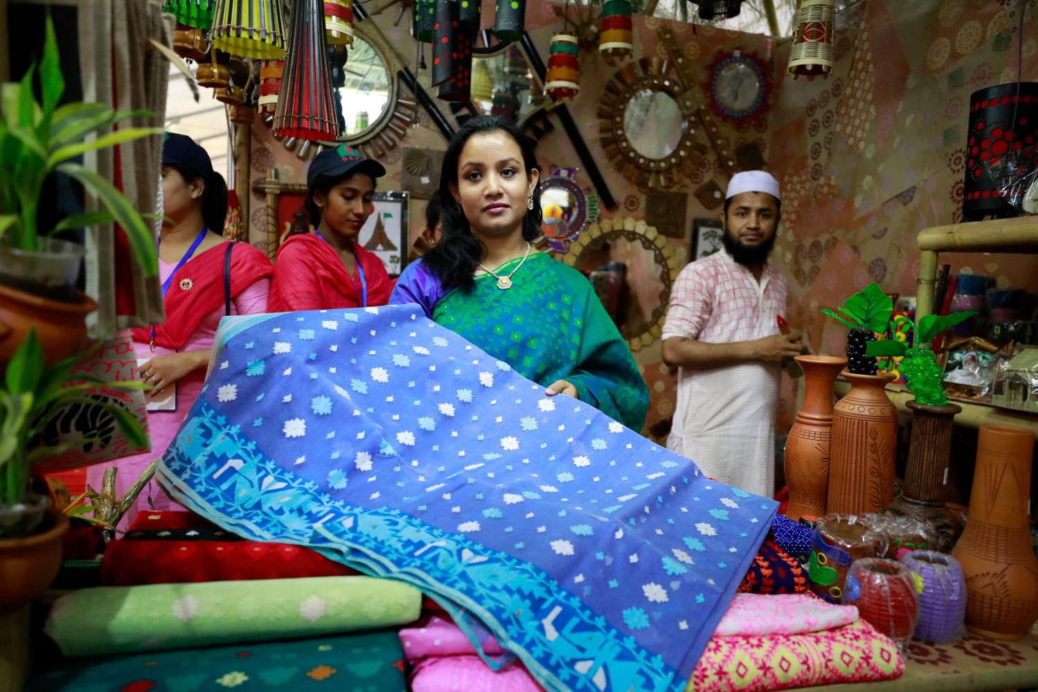 Dhaka, Bangladesh - April 04, 2018: Visitors look around the stalls at the sixth National SME Fair 2018, to be held over five days, begins with small and medium entrepreneurs at Dhaka in Bangladesh.