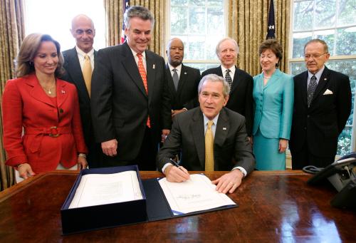 U.S. President George W. Bush (C) signs H.R. 1, Implementing Recommendations of the 9/11 Commission Act of 2007, in the Oval Office of the White House in Washington, August 3, 2007. Looking on are (L-R) Homeland Security Advisor Fran Townsend, Homeland Security Secretary Michael Chertoff, Congressman Peter King (R-NY), Congressman Bernie Thompson (D-MS), Senator Joe Lieberman (I-CT), Senator Susan Collins (D-ME) and Senator Ted Stevens (R-AK).     REUTERS/Jason Reed    (UNITED STATES)