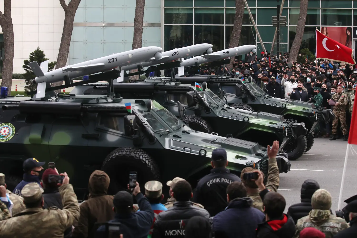 BAKU, AZERBAIJAN - DECEMBER 10, 2020: Cobra armored vehicles equipped with PK machine guns and Sky Striker loitering munitions take part in a military parade marking the end of the Nagorno Karabakh military conflict. Valery Sharifulin/TASS.No use Russia.