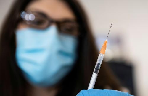 FILE PHOTO: Nurse Nicole McCurrach, 48, draws up coronavirus disease (COVID-19) vaccinations at Richmond raceway in Richmond, Virginia, U.S., March 4, 2021. REUTERS/Julia Rendleman/File Photo