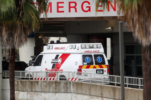 An ambulance enters the emergency room