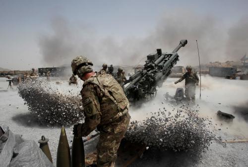 FILE PHOTO: U.S. Army soldiers from the 2nd Platoon, B battery 2-8 field artillery, fire a howitzer artillery piece at Seprwan Ghar forward fire base in Panjwai district, Kandahar province southern Afghanistan, June 12, 2011. REUTERS/Baz Ratner