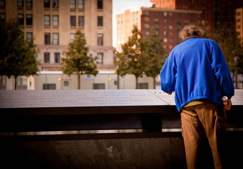 A man pauses by the National Sept. 11 Memorial in New York City. (Flickr/Sarah Le Clerc, https://flic.kr/p/dPcJkN; CC BY-ND 2.0, https://creativecommons.org/licenses/by-nd/2.0/)