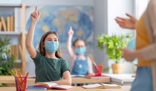 Girl learning in classroom