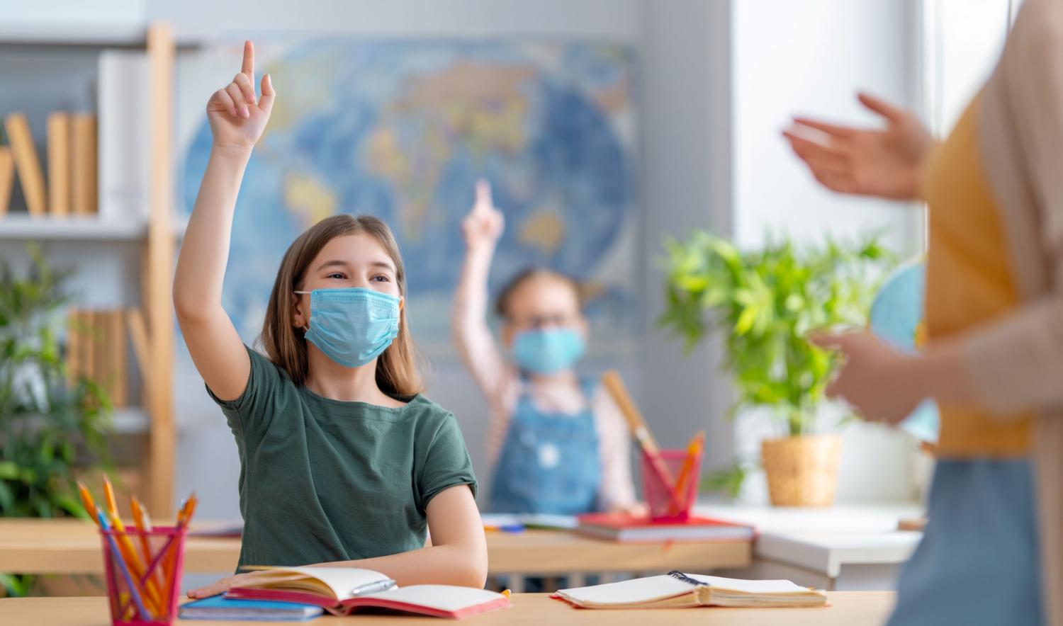 Girl learning in classroom