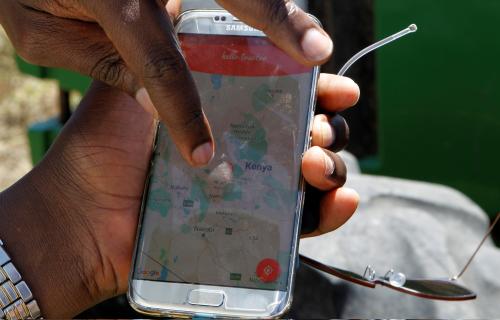 A mobile phone application shows movements of a John Deere 5503 tractor, installed with the Hello Tractor technology that connects farmers with vehicles' owners, in Umande village in Nanyuki, Kenya February 4, 2020. Picture taken February 4, 2020. REUTERS/Njeri Mwangi