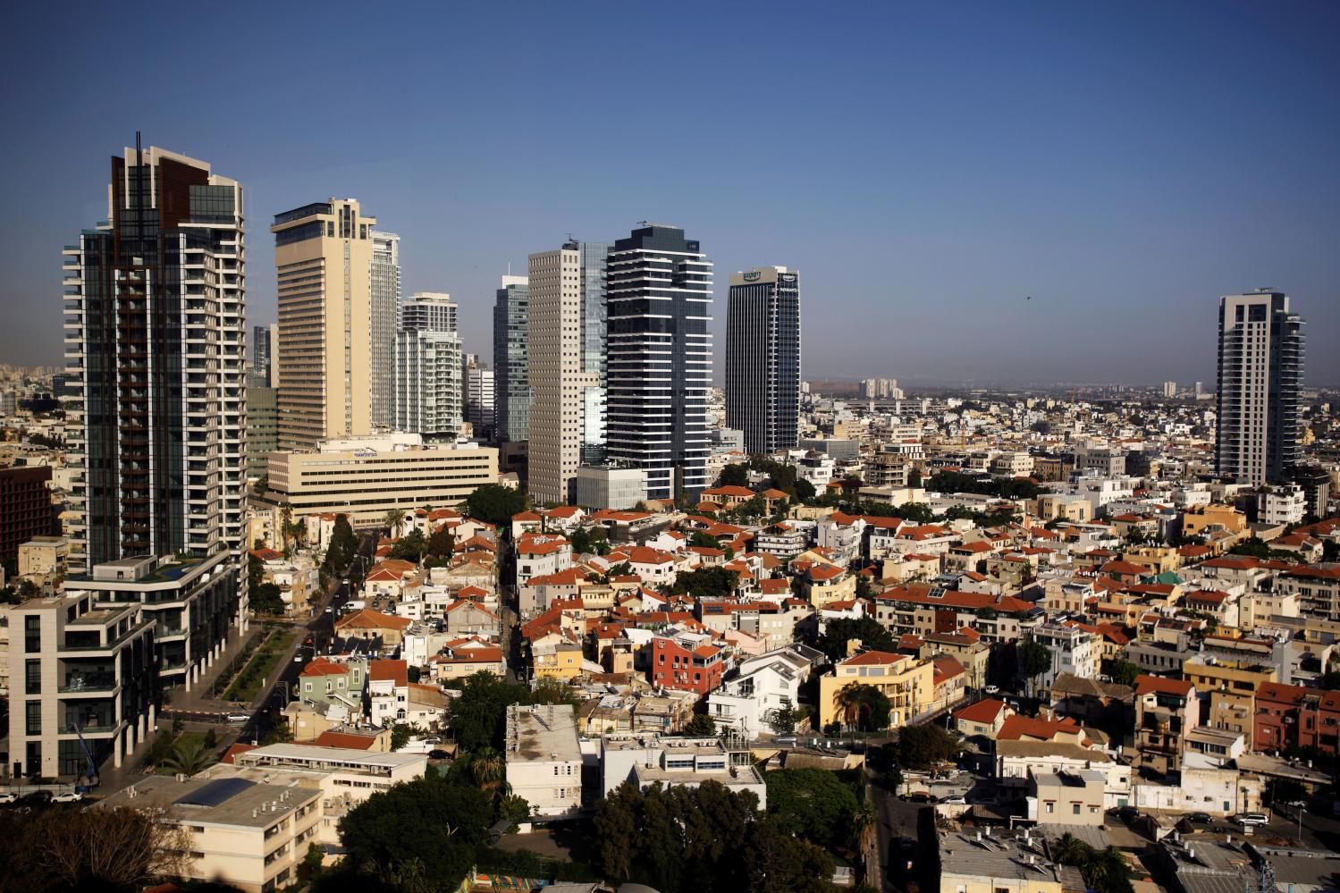 A general view of Tel Aviv's skyline is seen through a hotel window in Tel Aviv, Israel May 15, 2017. Picture taken May 15, 2017. REUTERS/Amir Cohen