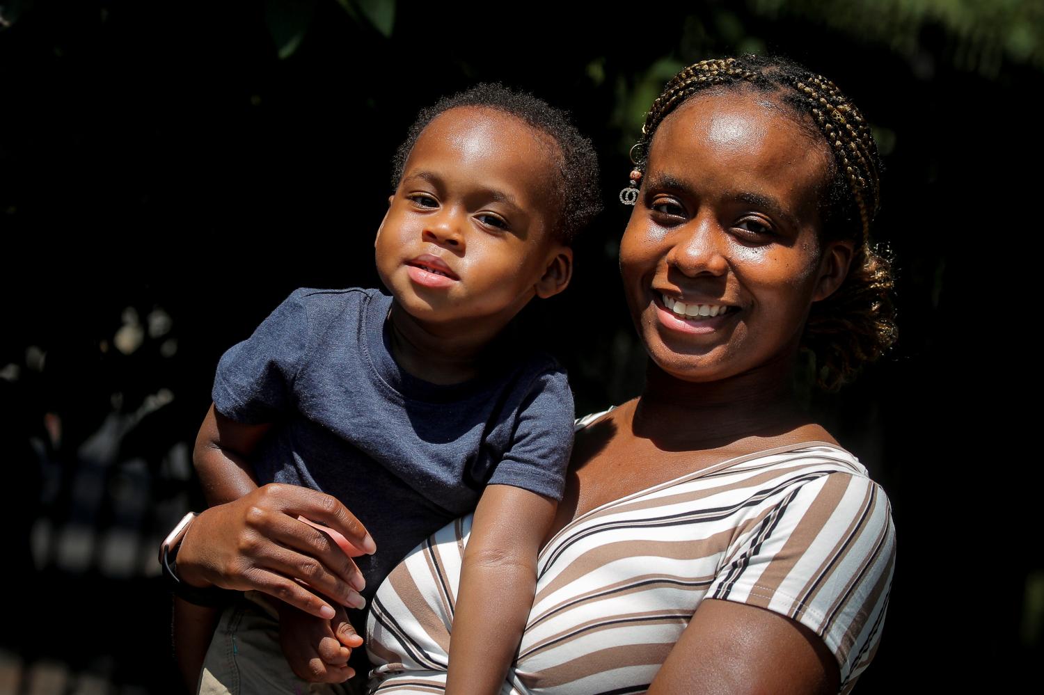 Chantel Springer poses with her son Jasiah in the Brooklyn borough of New York, U.S., July 29, 2020. Picture taken July 29, 2020.  REUTERS/Brendan McDermid