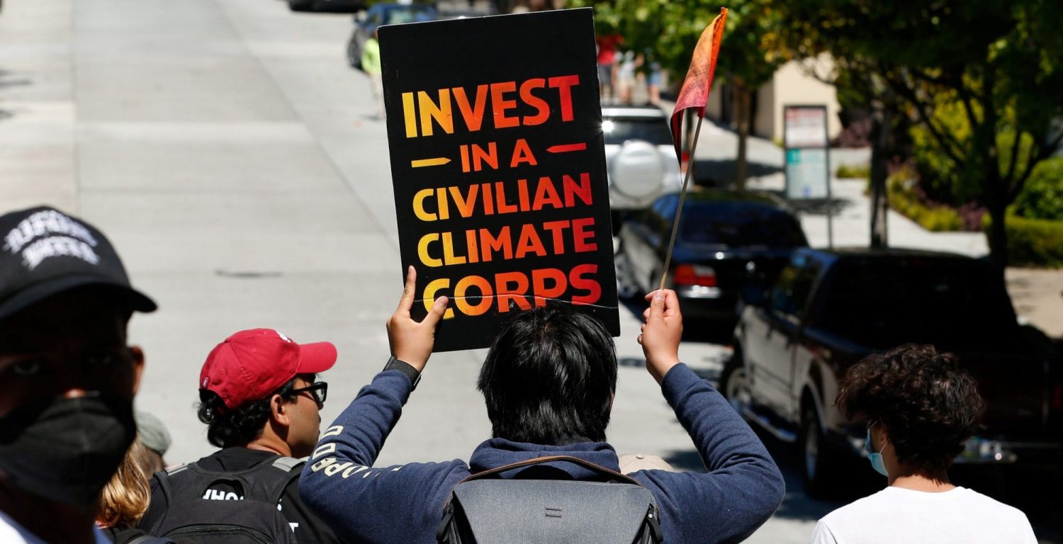Youth activists, who began their trek in Paradise, California, march across the Golden Gate Bridge to the home of House of Representatives Speaker Nancy Pelosi to highlight their demand of the creation of the Civilian Climate Corps, in San Francisco, California, U.S. June 14, 2021.  REUTERS/Amy Osborne