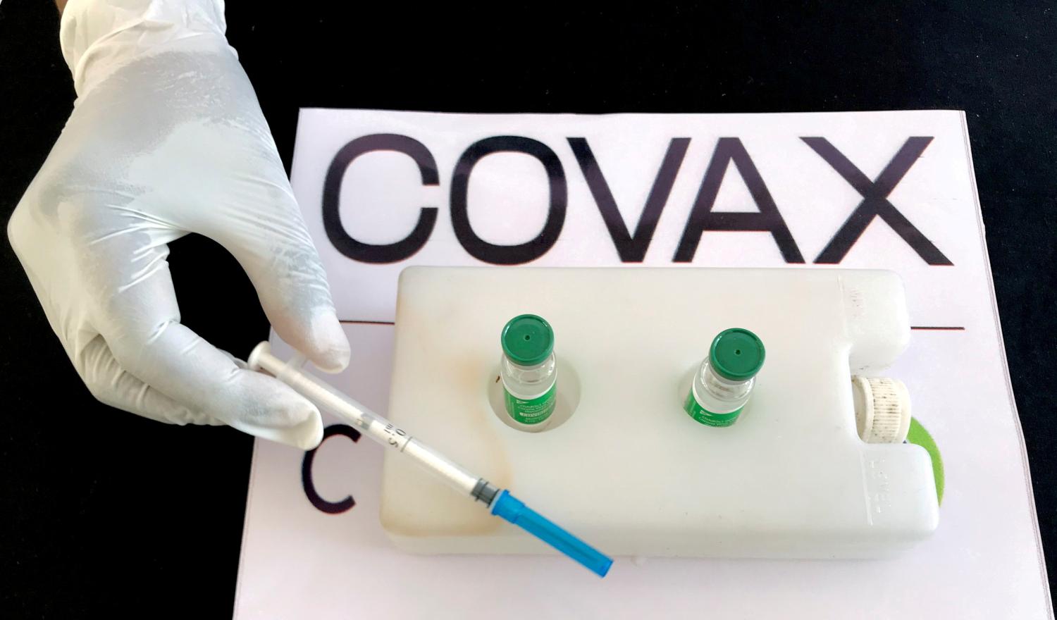 FILE PHOTO: A nurse prepares to administer the AstraZeneca/Oxford COVID-19 vaccine under the COVAX scheme at the Eka Kotebe General Hospital in Addis Ababa, Ethiopia March 13, 2021. REUTERS/Tiksa Negeri/File Photo