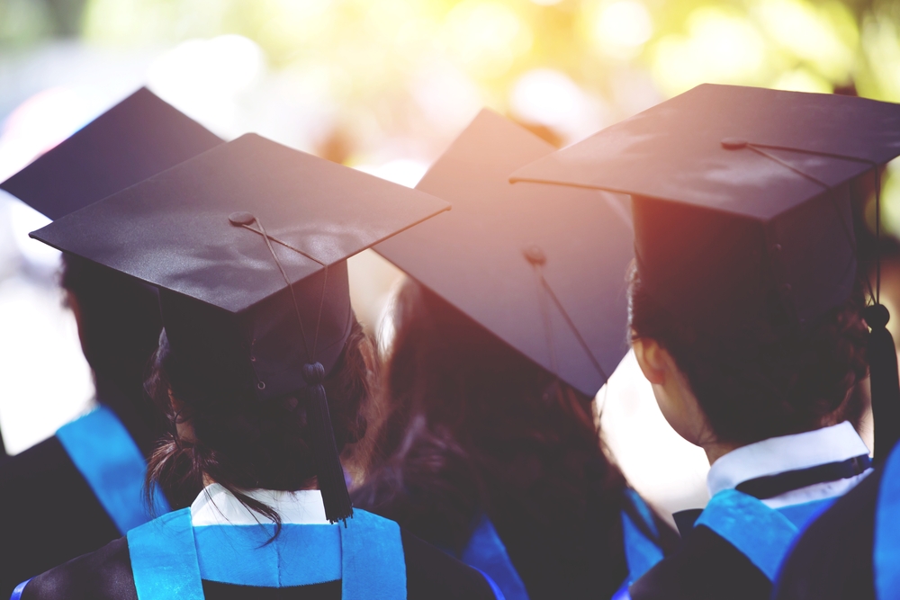 College graduation graduates wearing caps and gowns