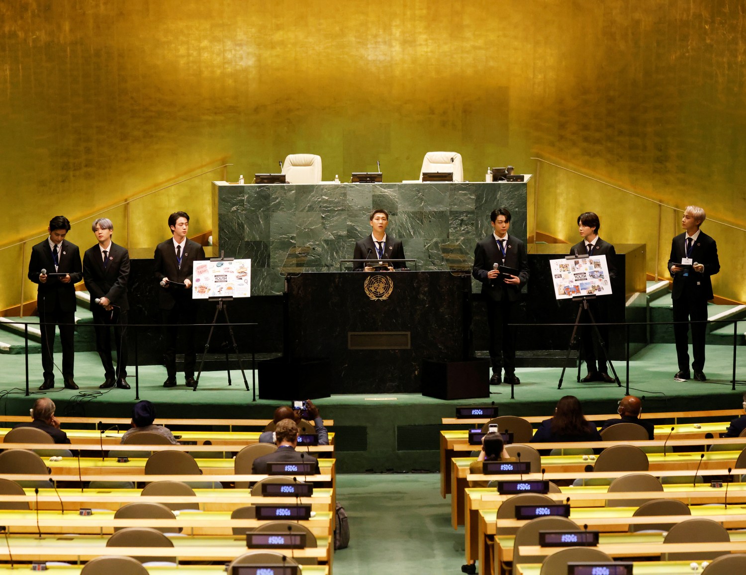 (L to R) Taehyung/V, Suga, Jin, RM, Jungkook, Jimin and J-Hope of South Korean boy band BTS speak at the SDG Moment event as part of the UN General Assembly 76th session General Debate in UN General Assembly Hall at the United Nations Headquarters, in New York, U.S., September 20, 2021. John Angelillo/Pool via REUTERS