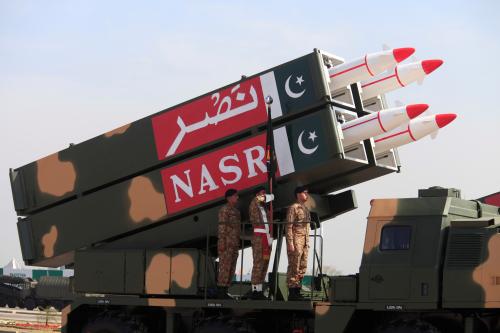 Pakistani military personnel stand beside short-range Surface to Surface Missile NASR during Pakistan Day military parade in Islamabad, Pakistan, March 23, 2017. REUTERS/Faisal Mahmood