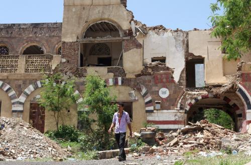 A worker walks past the National Museum in the southwestern city of Taiz, Yemen May 26, 2021. Picture taken May 26, 2021. REUTERS/Anees Mahyoub