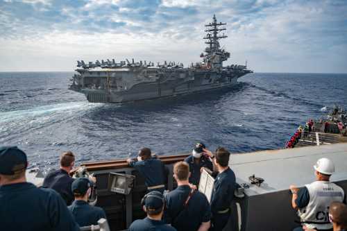 Hand out photo dated May 30, 2020 of The Arleigh-burke class guided-missile destroyer USS Barry (DDG 52) conducts a replenishment at sea training evolution alongside the Nimitz class aircraft carrier USS Ronald Reagan (CVN 76). Two US aircraft carriers have carried out drills in the South China Sea, a US Navy spokesman said Saturday, after the Pentagon expressed concerns over Chinese military exercises around a disputed archipelago. The USS Nimitz and USS Ronald Reagan conducted dual carrier operations in the waterway to "support a free and open Indo-Pacific," the spokesman said. China's expanding military presence in the contested waters has worried several of its neighbours. U.S. Navy photo by Lt. j.g. Samuel Hardgrove via ABACAPRESS.COM