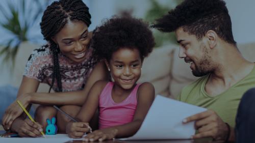 Parents helping child with schoolwork