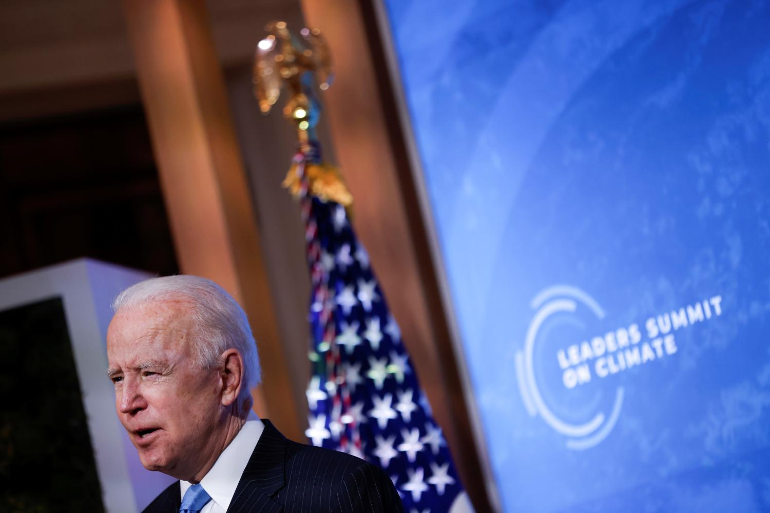 U.S. President Joe Biden delivers remarks in a virtual Climate Summit with world leaders in the East Room at the White House in Washington, U.S., April 23, 2021. REUTERS/Tom Brenner