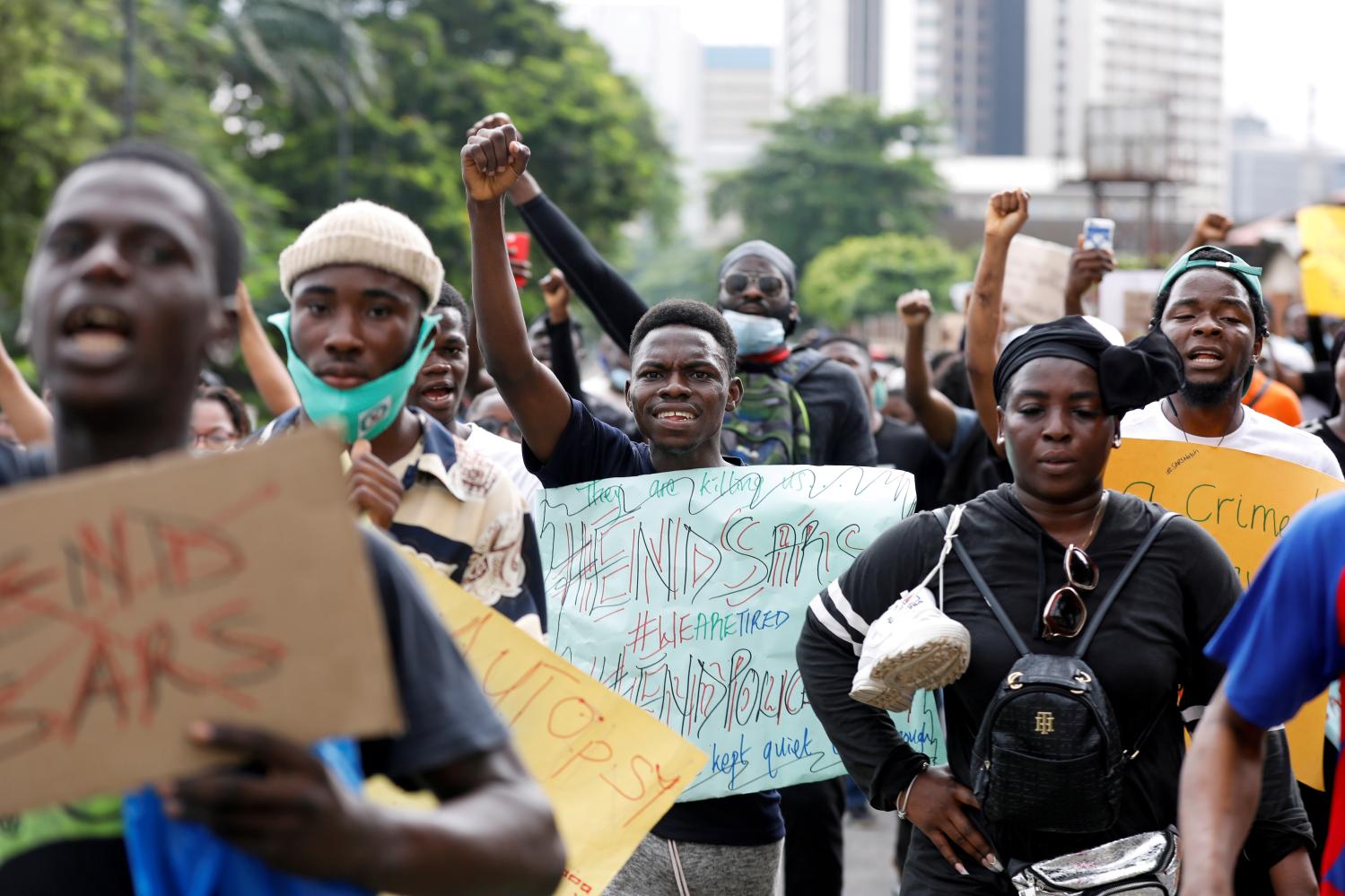 Nigerians take part in a protest against alleged violence, extortion and harassment from Nigeria's Special Anti-Robbery Squad (SARS), in Lagos, Nigeria October 11, 2020. REUTERS/Temilade Adelaja     TPX IMAGES OF THE DAY