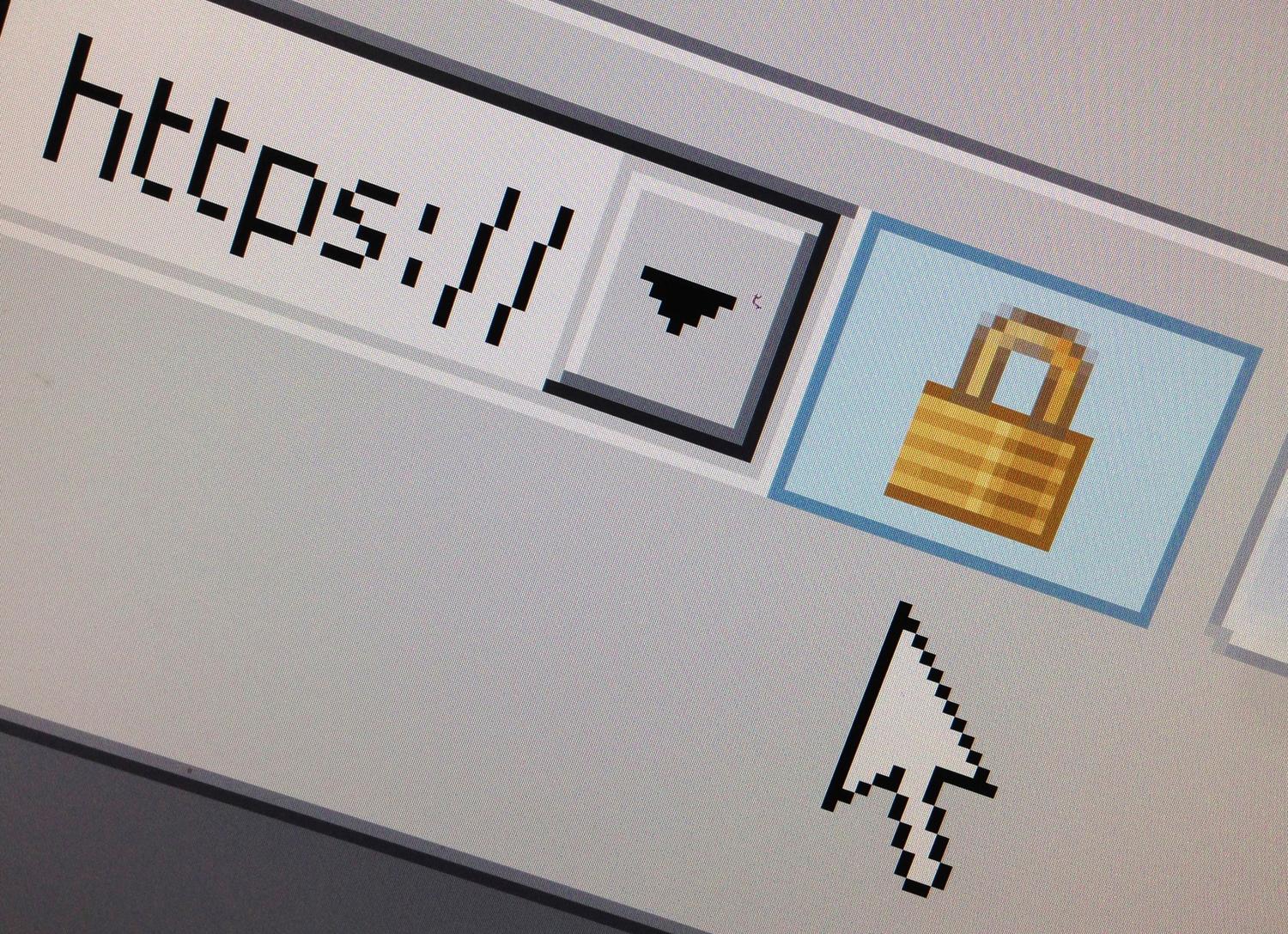 A computer mouse hovers over a lock icon signifying an encrypted internet connection on a web browser.