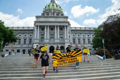 Sunrise Movement members rallied at the Pennsylvania State Capitol in Harrisburg, Pennsylvania on June 21, 2021. The rally launched a 105-mile, week-long trek to Washington, DC where they will meet up with other Sunrise groups and deliver demands to the Biden Administration and Congress. (Photo by Paul Weaver/Sipa USA)No Use Germany.