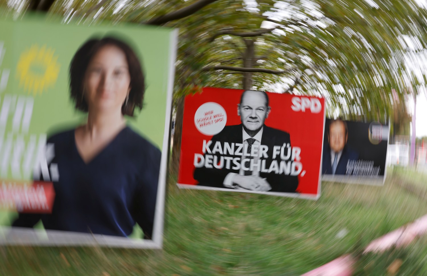 Election posters of Germany's top candidates for chancellor—Annalena Baerbock, co-leader of Germany's Green party, Olaf Scholz, of the Social Democratic Party, and Armin Laschet of the Christian Democratic Union leader—are displayed in Berlin.