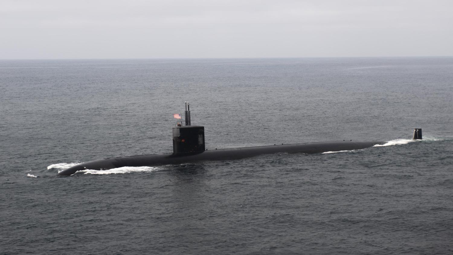 Handout file photo dated September 28, 2021 of the Los Angeles-class fast-attack submarine USS Columbia (SSN 771) conducts tactical maneuvers and naval formations during a training exercise. A US navy nuclear engineer and his wife have been charged with trying to sell nuclear secrets to what they thought was a foreign state. Jonathan Toebbe and his wife Diana were arrested in West Virginia on Saturday, the Justice Department announced. They allegedly tried to sell nuclear submarine design data, hidden in a peanut butter sandwich, to someone they thought represented another country. In fact, it was an undercover FBI agent. U.S. Navy photo by Mass Communication Specialist 2nd Class James S. Hong via ABACAPRESS.COM