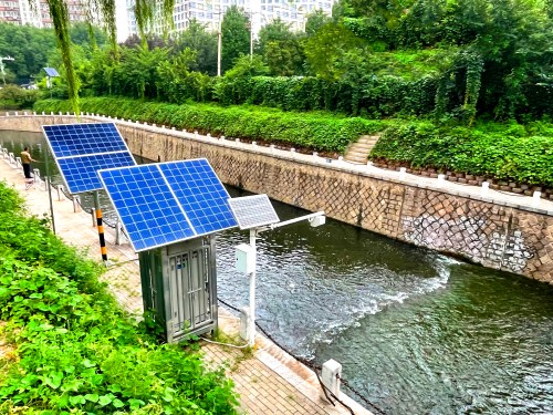A water quality monitoring micro station in operation at the North Second Ring Road moat in North China's Beijing, 23 August 2021.