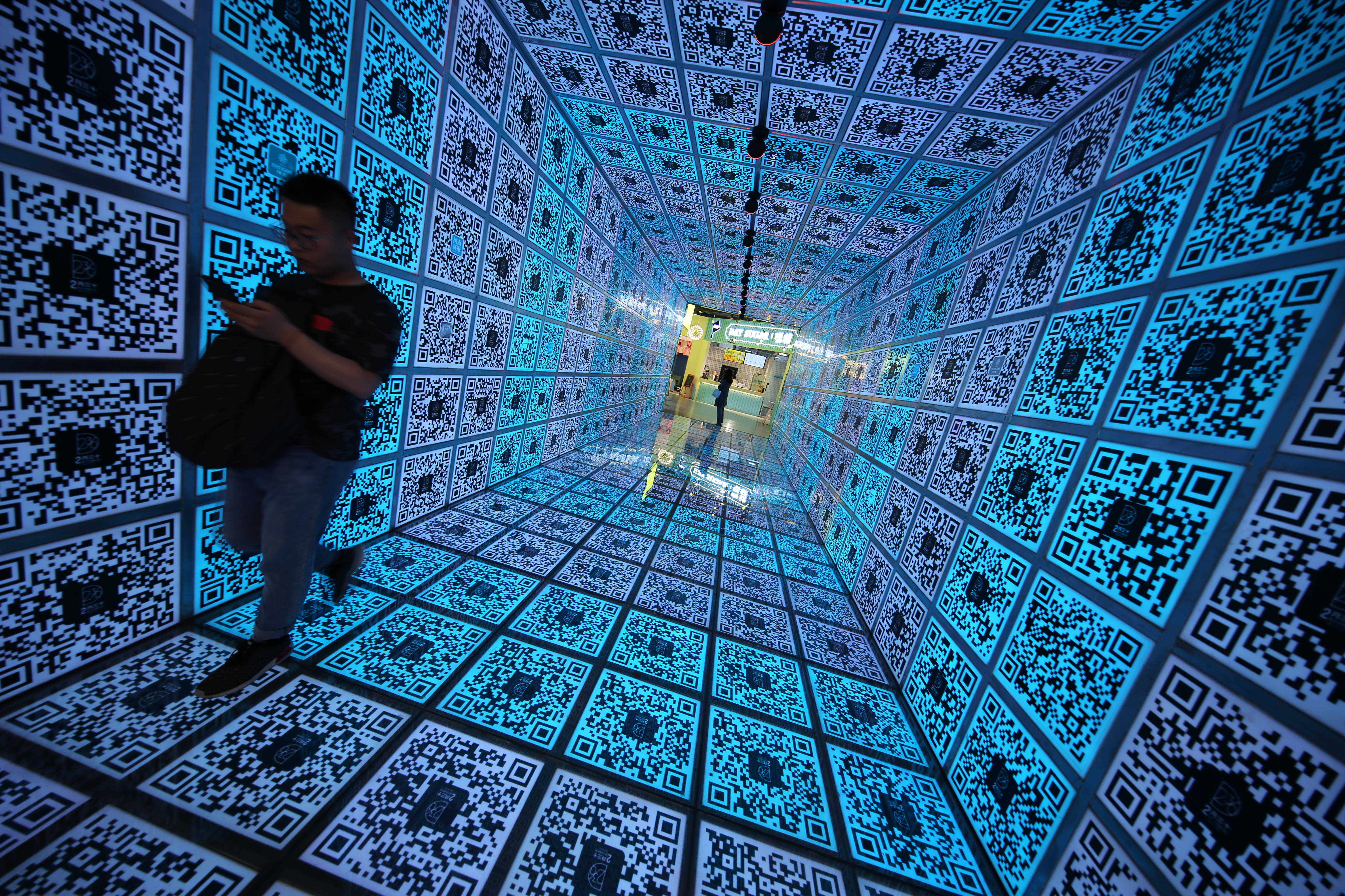 View of a 12-meter-long QR code tunnel in Zhengzhou city, central China's Henan province, 23 April 2019.A tunnel featuring QR code appeared in a shopping mall in central China's Zhengzhou. This tunnel is made of 552 QR codes.No Use China. No Use France.