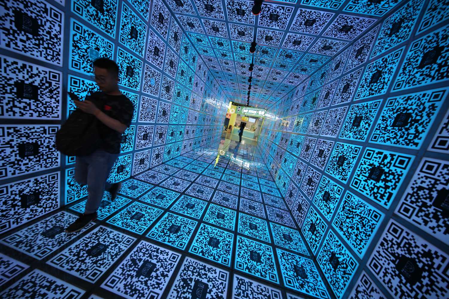 View of a 12-meter-long QR code tunnel in Zhengzhou city, central China's Henan province, 23 April 2019.A tunnel featuring QR code appeared in a shopping mall in central China's Zhengzhou. This tunnel is made of 552 QR codes.No Use China. No Use France.