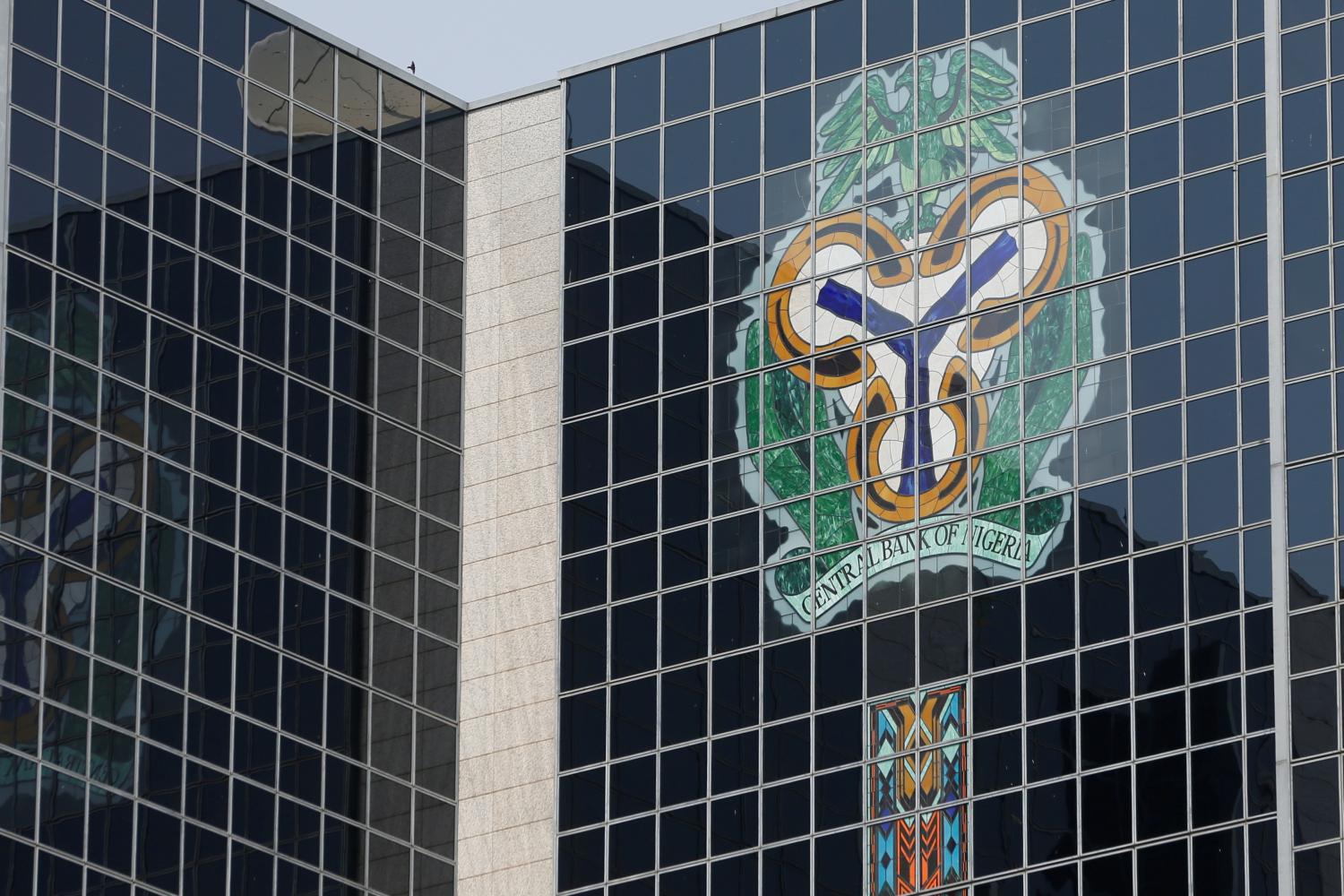 FILE PHOTO: The Central Bank of Nigeria's logo is seen on its headquarters building in Abuja, Nigeria, January 22, 2018. REUTERS/Afolabi Sotunde/File Photo