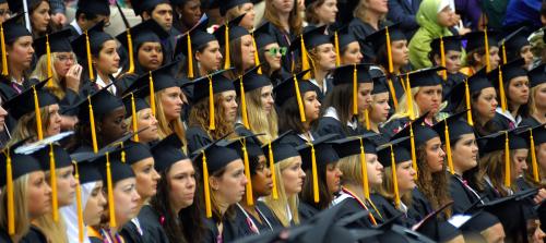 women graduating college