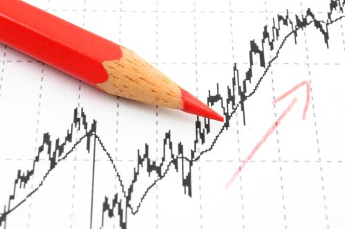 Financial chart with upward arrow drawn in pencil