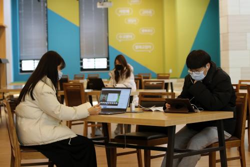 GWANGJU, SOUTH KOREA - Students listen to online classes in the library of Gwangju University, South Korea on March 16, 2020. Affected by the new coronavirus epidemic, colleges and universities in South Korea delayed the school for two weeks and online teaching activities began.