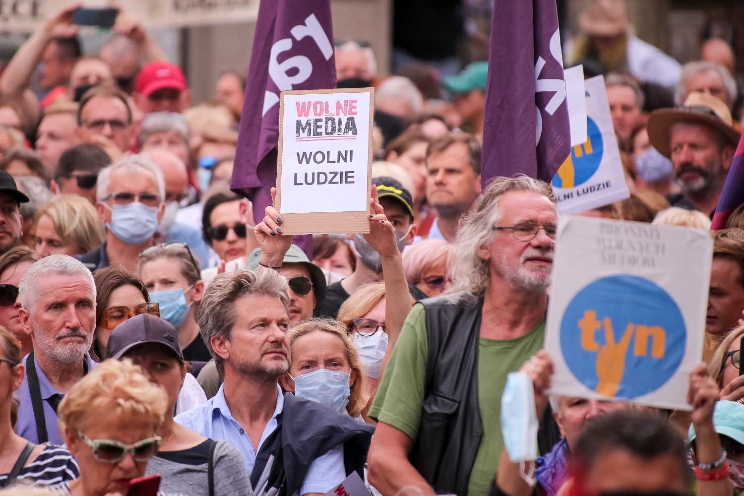 Protesters hold placards during a protest in defense of free media in Gdansk.A protest against the "lex anti-TVN" law, which will not extend TVN's license. TVN does not support the official policy of the government and is considered a guarantor of independent information in Poland. (Photo by Tomasz Zasinski / SOPA Images/Sipa USA)No Use Germany.