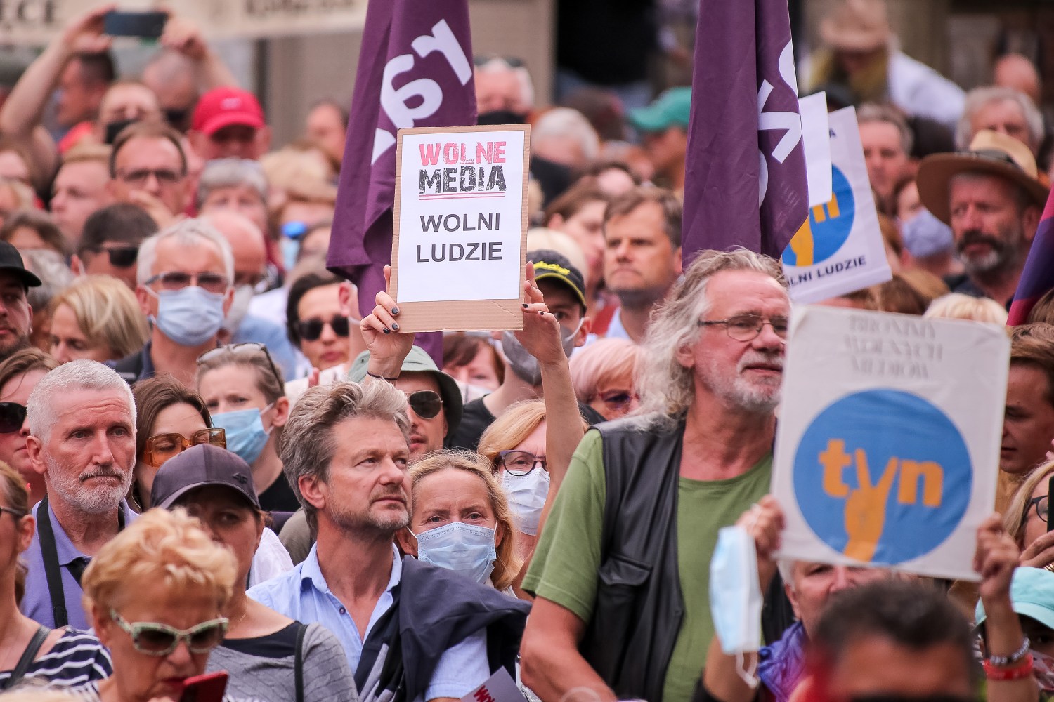 Protesters hold placards during a protest in defense of free media in Gdansk.A protest against the "lex anti-TVN" law, which will not extend TVN's license. TVN does not support the official policy of the government and is considered a guarantor of independent information in Poland. (Photo by Tomasz Zasinski / SOPA Images/Sipa USA)No Use Germany.