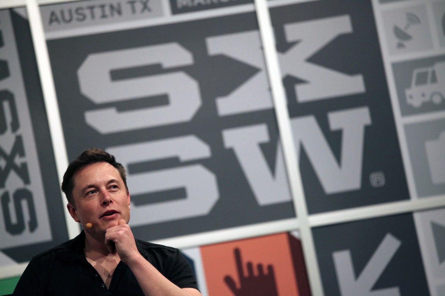 FILE PHOTO: Elon Musk, the chief executive of Tesla Motor, speaks at the South by Southwest Interactive festival in Austin, Texas, March 9, 2013. REUTERS/Gerry Shih/File Photo