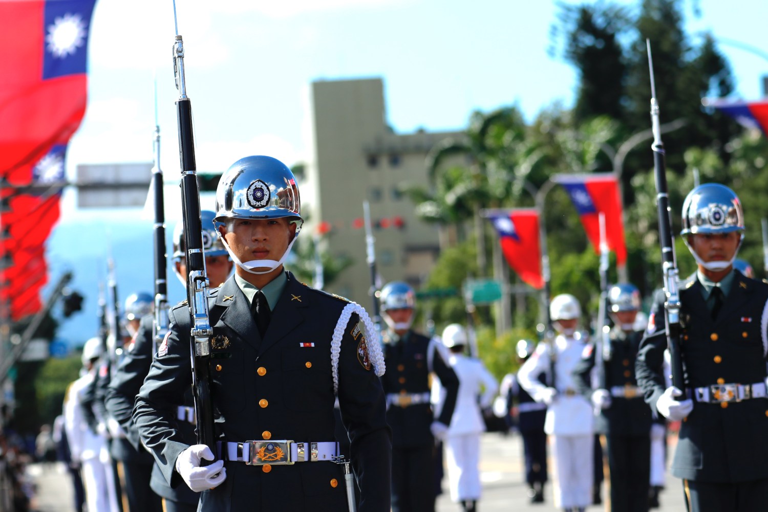 Soldiers take part in a parade during the National Day Celebration, following Chinese President Xi Jinpings vow to unify Taiwan by peaceful means, in Taipei, Taiwan, 10 October 2021. The self ruled island has been facing intensifying military threats from China including record number of fighter jets cruising around Taiwan, whilst building better relations with the US, Australia, Japan and European countries including Lithuania, Poland and the Czech Republic.  (Photo by Ceng Shou Yi/NurPhoto)NO USE FRANCE
